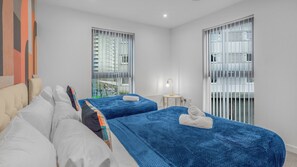 2 habitaciones, tabla de planchar con plancha, wifi y ropa de cama