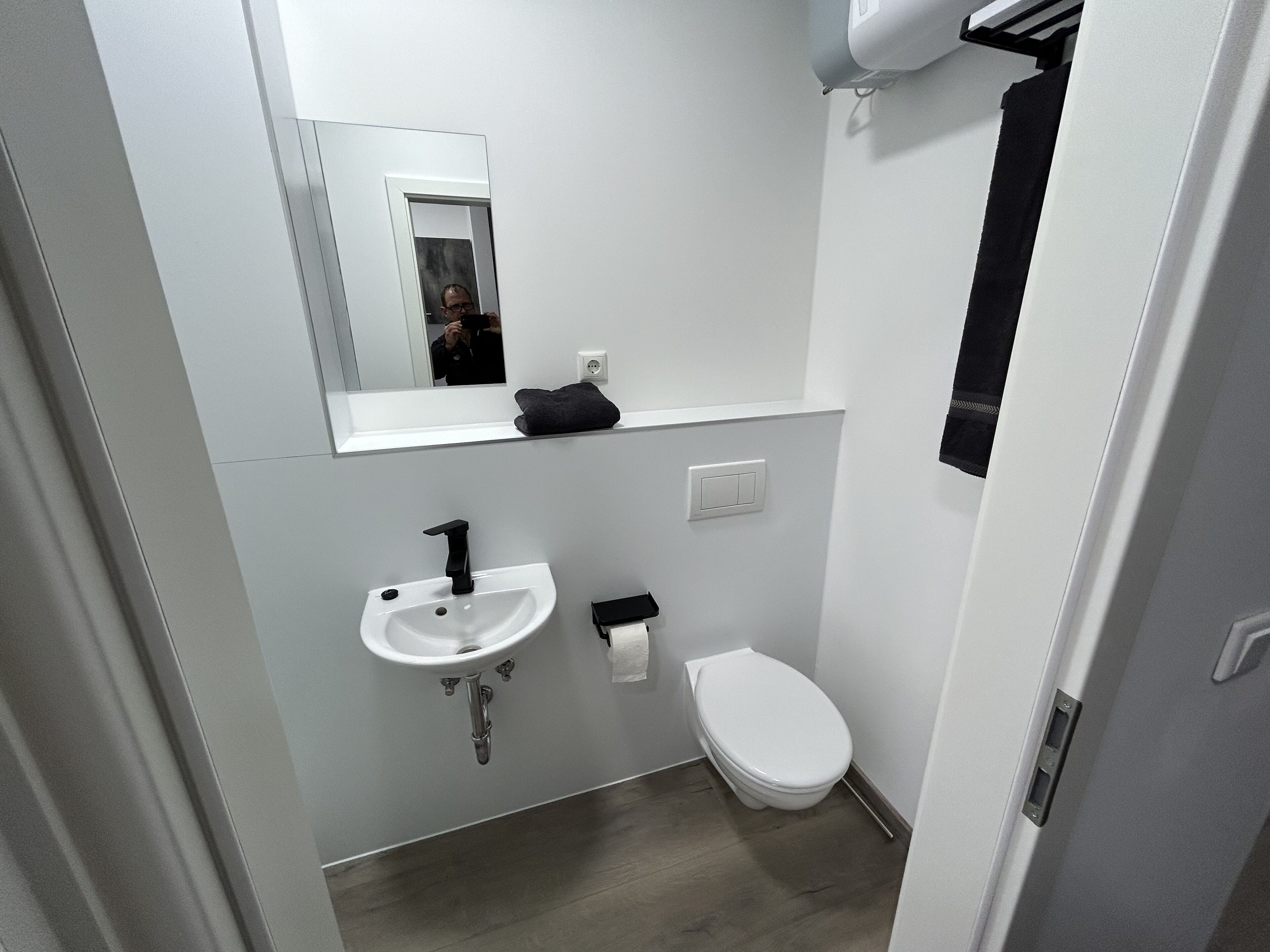 Shower, towels, toilet paper
