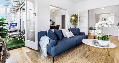 Historic beachfront apartment with bay views