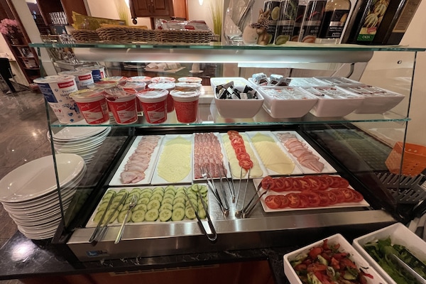 Daily buffet breakfast (EUR 25 per person)