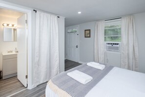 1 bedroom, desk, iron/ironing board, travel cot