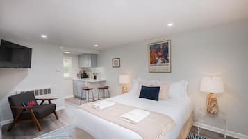 1 bedroom, desk, iron/ironing board, travel crib