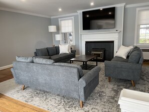 Smart TV, fireplace, foosball, books