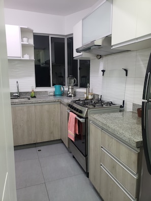 Fridge, microwave, oven, stovetop