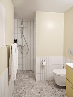 Shower, eco-friendly toiletries, hair dryer, towels