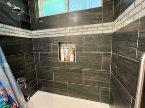 Shower, hair dryer, towels