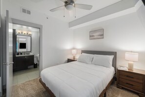 1 bedroom, desk, iron/ironing board, travel crib