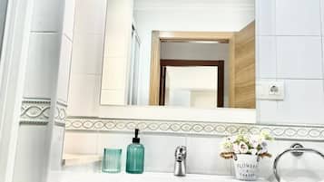 Hair dryer, bidet, towels, soap