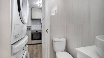 Apartment | Bathroom | Combined shower/tub, deep soaking tub, hair dryer, towels