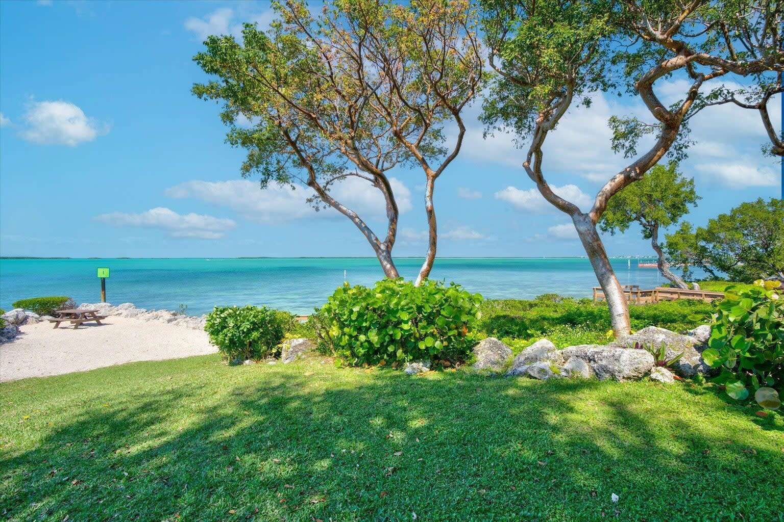 Luxury Condo in Exclusive Buttonwood Bay w/ Slip