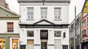 A building with a sign reading "SLATER STREET APARTMENTS" and "STANDREWS" above the entrance. - Host Stay Slater Street Apartments (Liverpool)