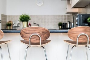 Apartamento | 2 dormitorios y tabla de planchar con plancha