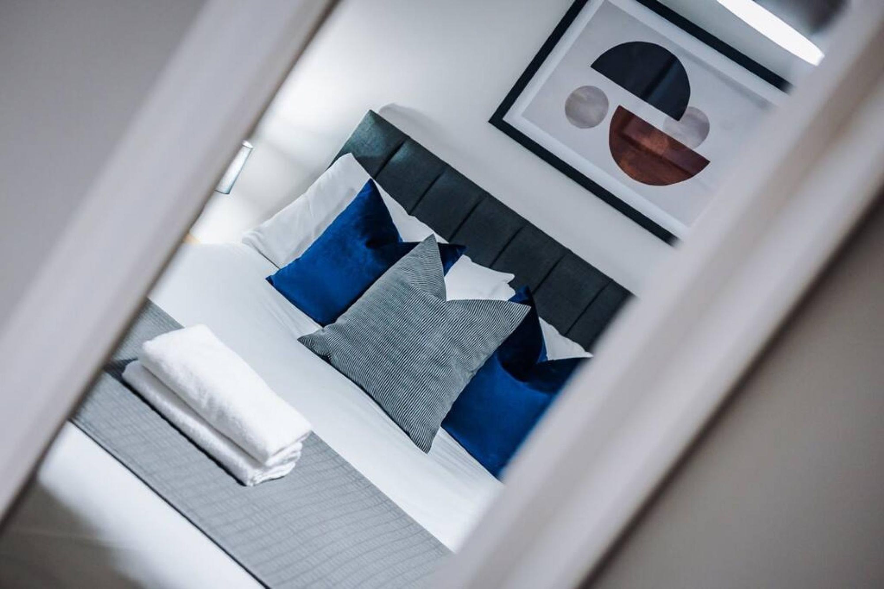 Apartamento | 1 dormitorio y tabla de planchar con plancha