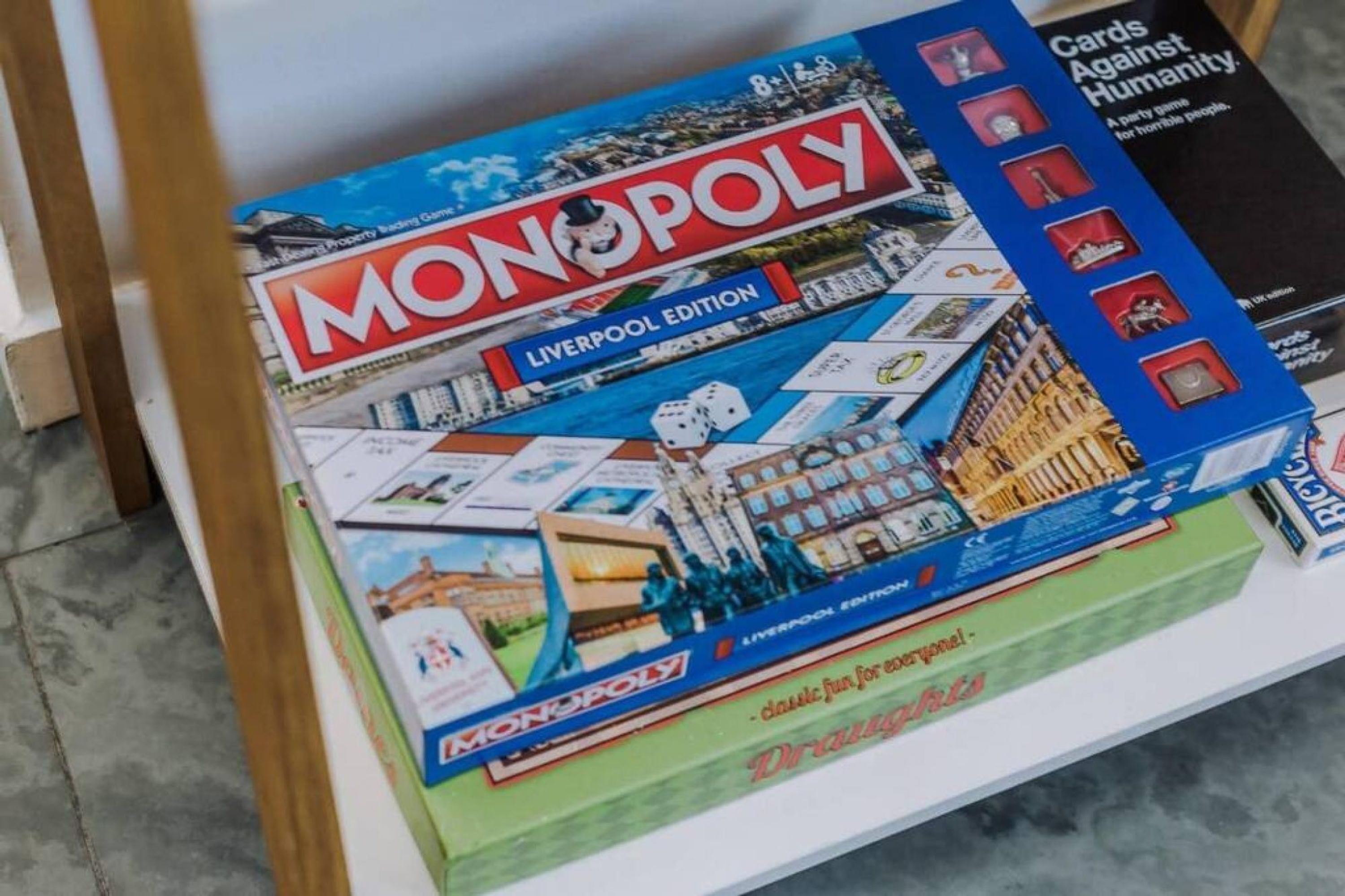 A Monopoly board game with a Liverpool Edition box.