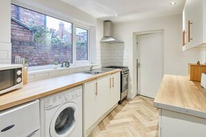 Casa | 2 quartos, ferros/tábuas de passar roupa