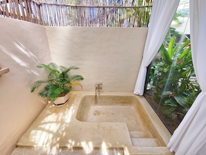 Junior Villa, Pool View | Bathroom | Bathtub, designer toiletries, hair dryer, slippers - Red Sands Mui Ne (Phan Thiet)