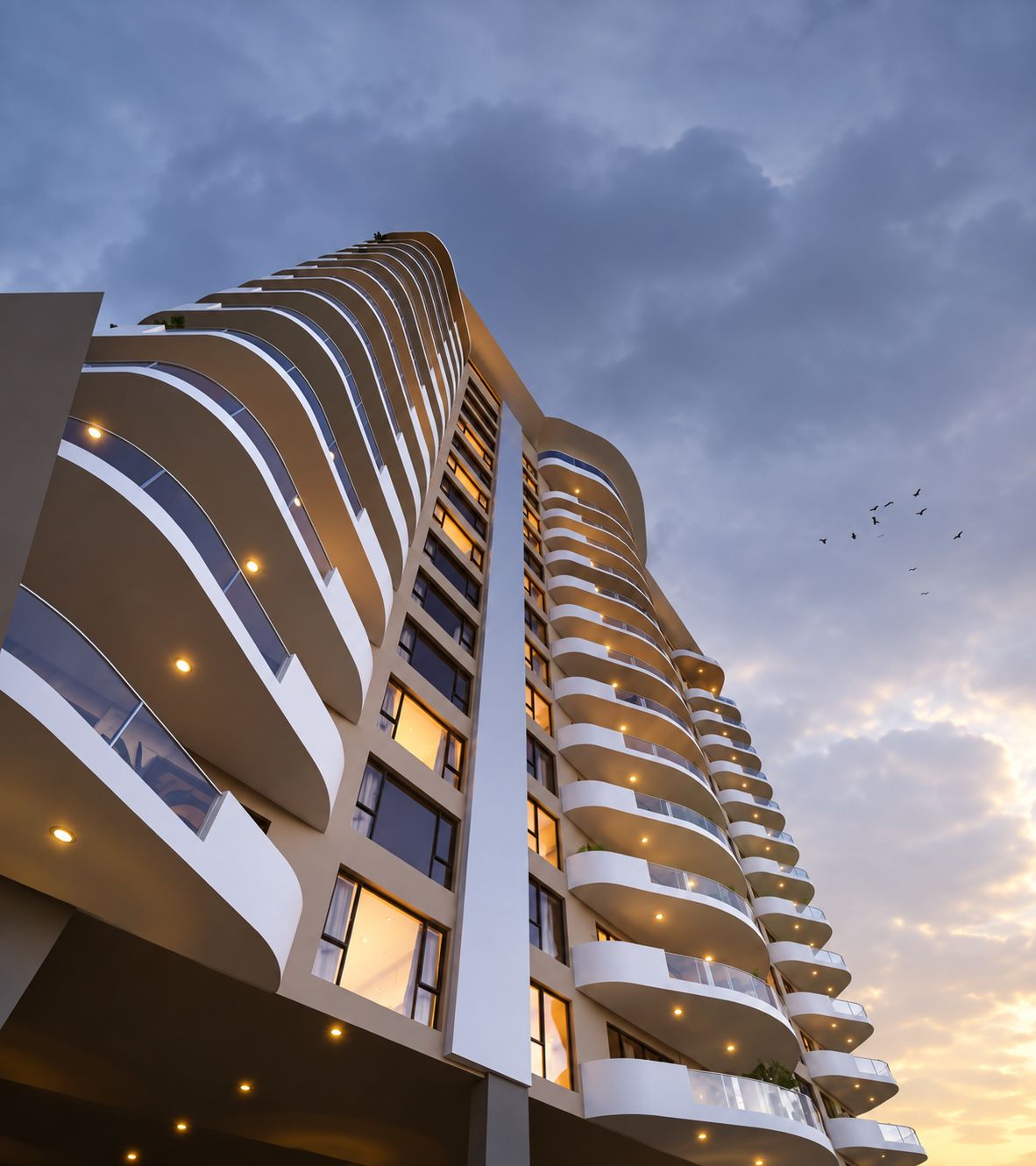 A high-rise building with multiple balconies and a curved facade.