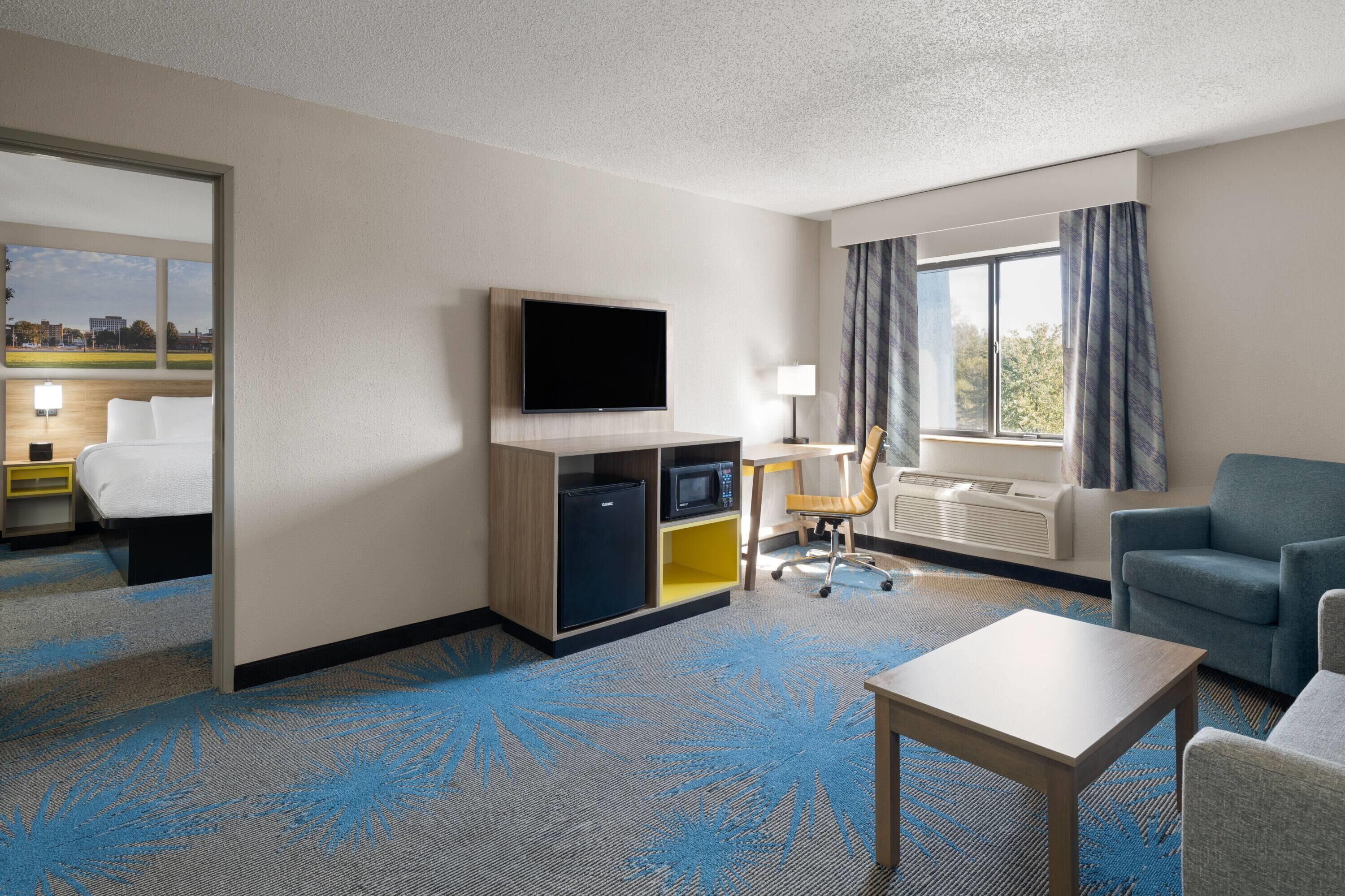 Suite, 1 Bedroom, Non Smoking (1 King Bed) | Individually decorated, individually furnished, desk, laptop workspace