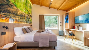 Deluxe Suite, Courtyard View | 1 bedroom, Frette Italian sheets, premium bedding, down comforters