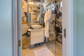 Shower, free toiletries, hair dryer, bathrobes