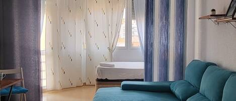 Strykjärn/strykbräda och sängkläder