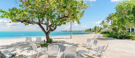 On the beach, sun loungers, beach towels