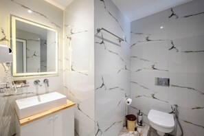 Free toiletries, hair dryer, slippers, bidet