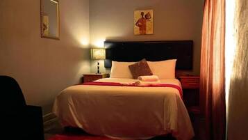 1 غرفة نوم ومكواة/لوح كي وواي فاي وملاءات أسرّة