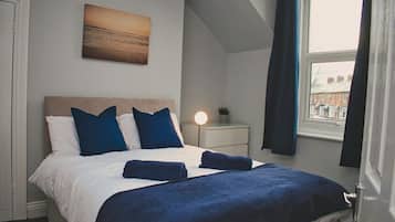 2 dormitorios, tabla de planchar con plancha, wifi gratis y ropa de cama