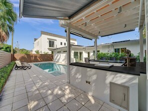 Terrace/patio - Exquisite Oasis: Luxe 3BR Home w/Salt-Water Pool, BBQ & Game Room
 (Fort Lauderdale)