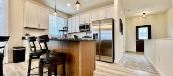 Beautiful NEW Ranch Home with a large deck & games