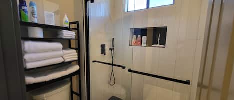 Hair dryer, towels, soap, toilet paper