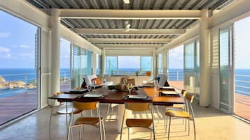 Apartamento | Restaurante al aire libre