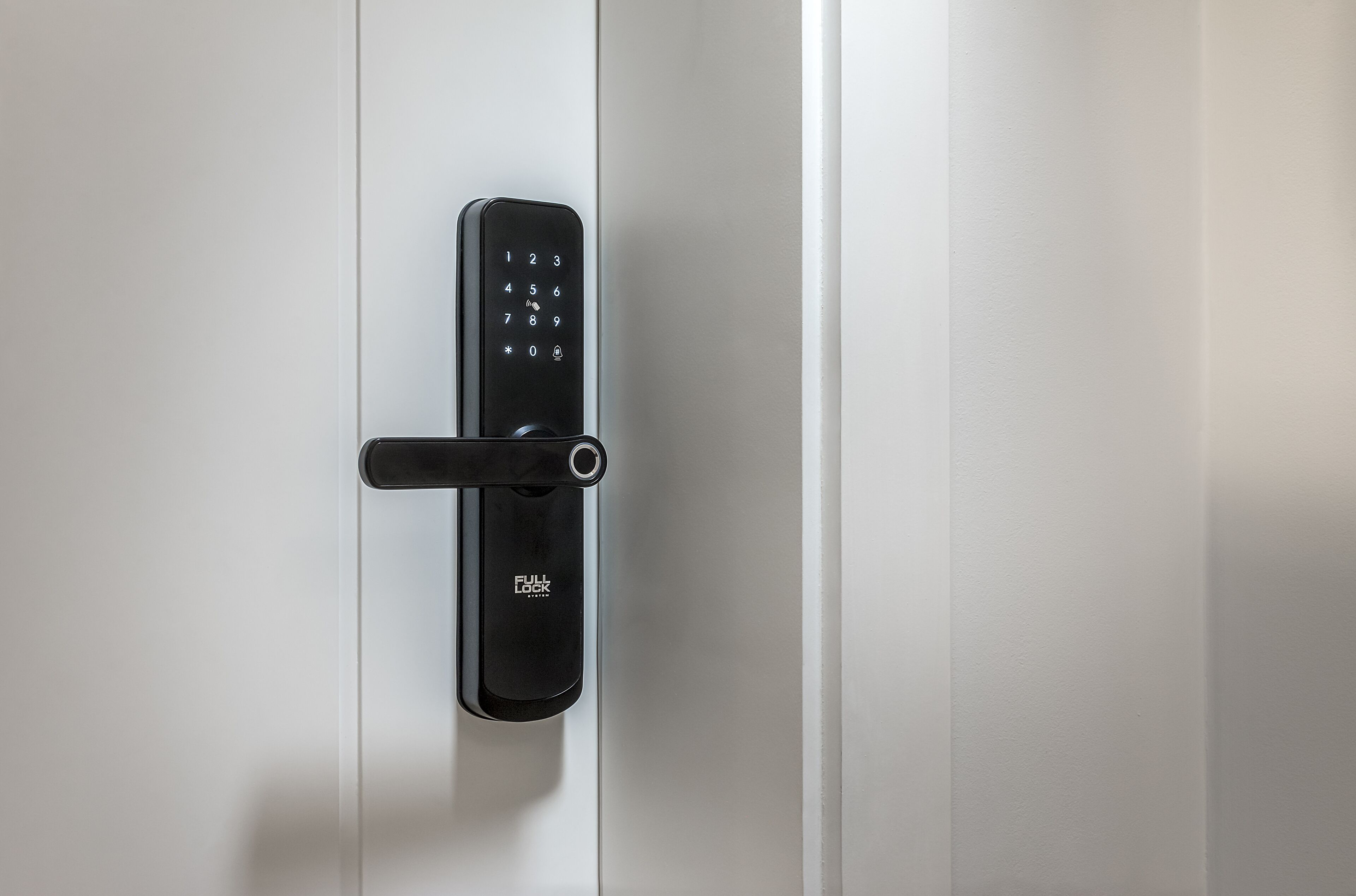 A modern door with a numeric keypad lock and a full lock indicator.