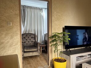 Apartment, 2 Bedrooms, Smoking, Balcony | Living area | Books - Lalla Ghita Appartement Á Essaouira Medina (Essaouira)