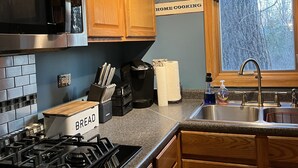 Private kitchen - Delightful cottage with huge yard on heavily wooded one acre lot in Union Pier. (Union Pier)