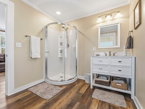 Shower, hair dryer, towels, soap