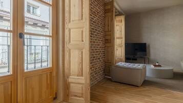 Apartamento | Área de estar | Smart TV 40 polegadas com canais a cabo