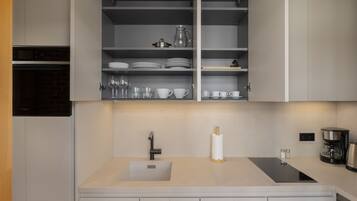 Apartamento | Cocina privada | Frigorífico, microondas, horno y lavavajillas