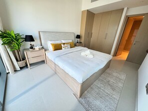 2 chambres, coffres-forts dans les chambres, fer et planche à repasser