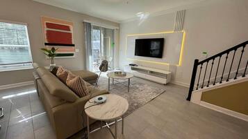 Premium House | Living room | TV