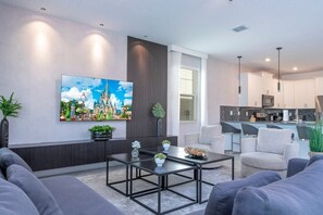 Premium House | Living room - Gorgeous 9Bd|Pool|Gameroom At Champions Gate 9088 (Davenport)