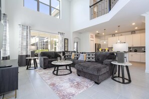 Comfort House | Living area - Stunning 5Bd W/ Pool Close To Disney At Champions Gate 8956 (Kissimmee)