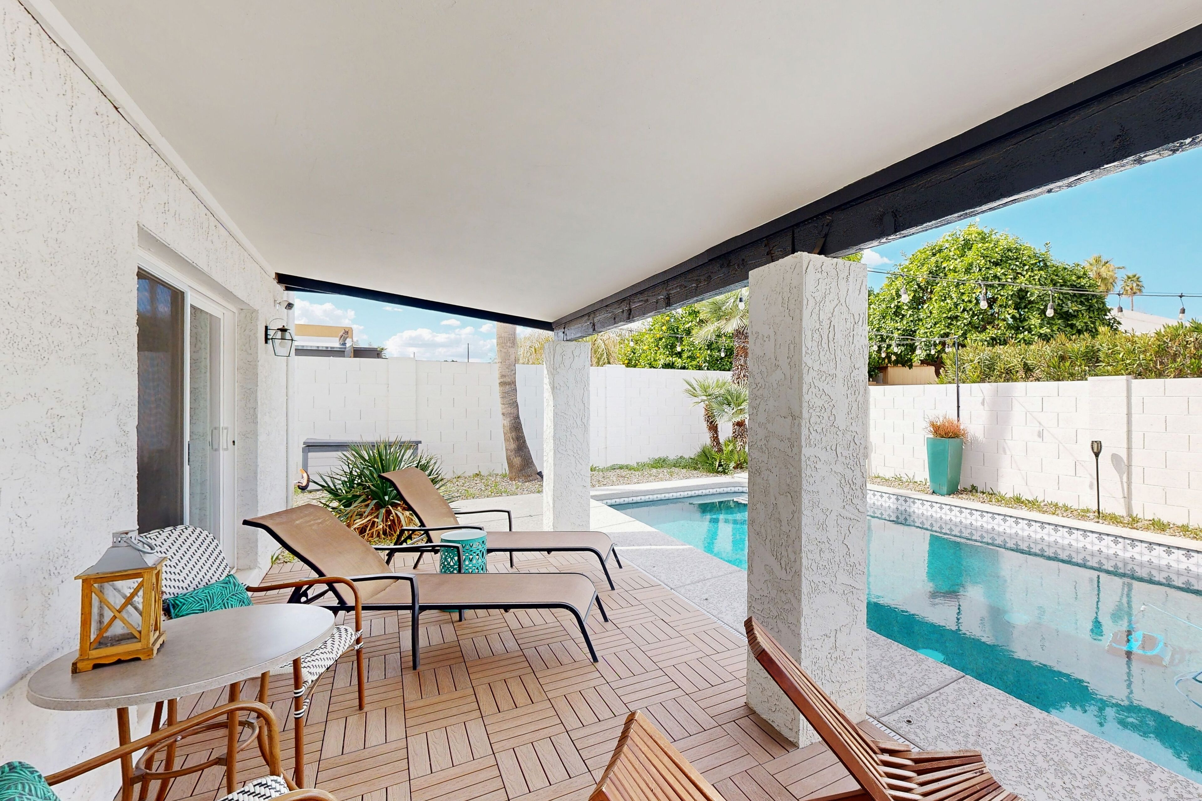 Stylish getaway with private pool, lawn games, patio, & bikes - near downtown
