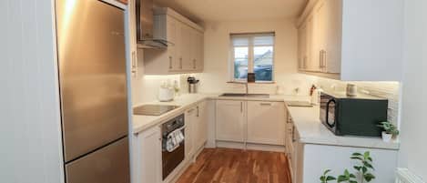 Dishwasher, electric kettle, toaster, cookware/dishes/utensils