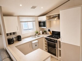 Luxury Mobile Home, 2 Bedrooms, Non Smoking | Private kitchen | Full-size fridge, microwave, stovetop, electric kettle