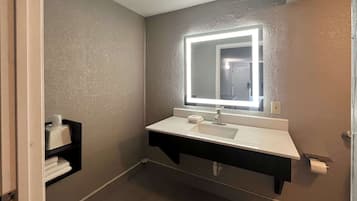 Combined shower/tub, towels, soap, toilet paper