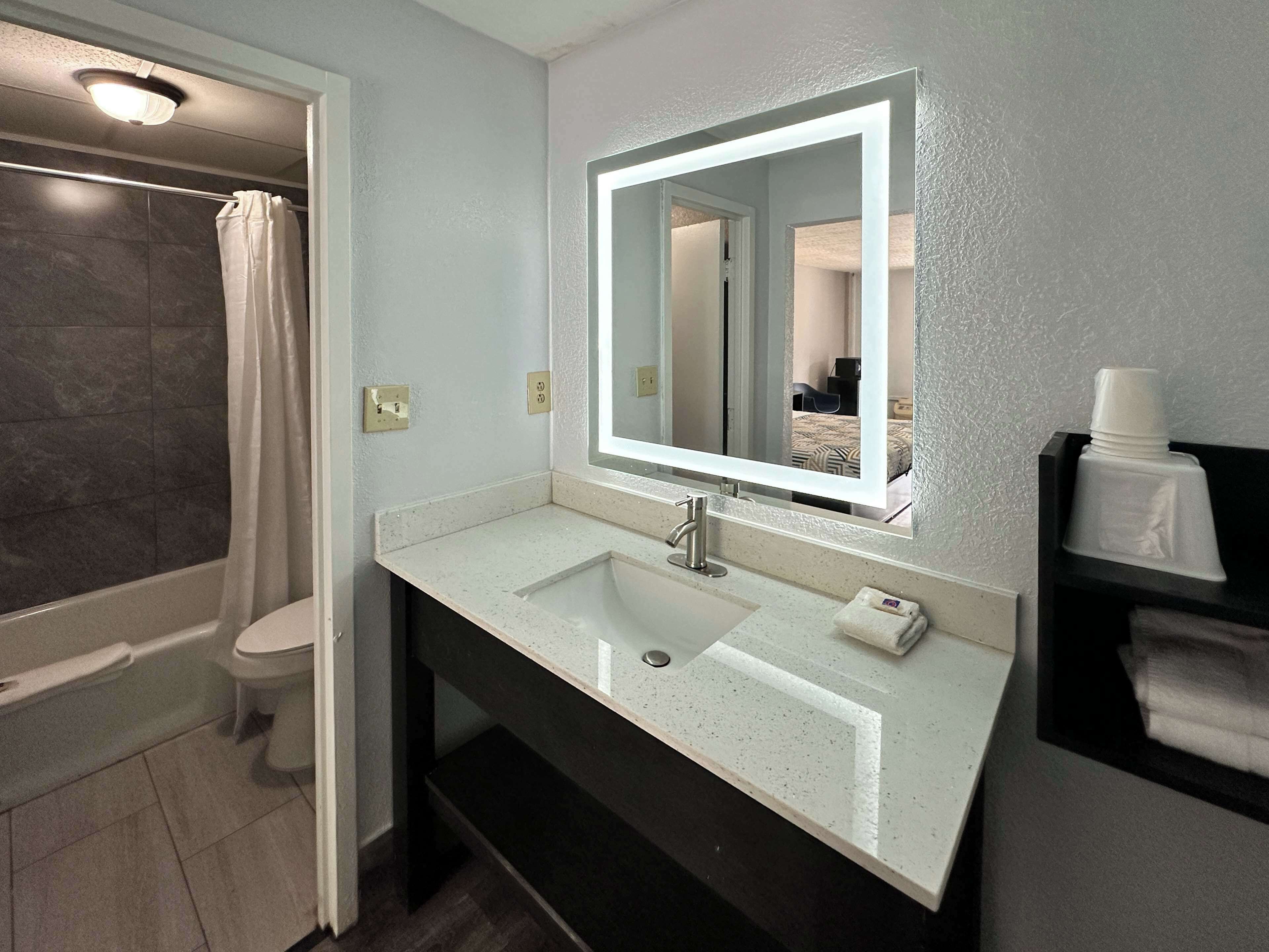 Combined shower/tub, towels, soap, toilet paper