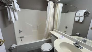 Combined shower/tub, towels, soap, toilet paper