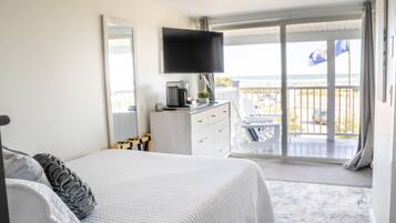 Tabla de planchar con plancha, wifi gratis y ropa de cama